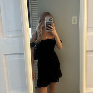 Black off the shoulder eyelet mini with ruffle detail